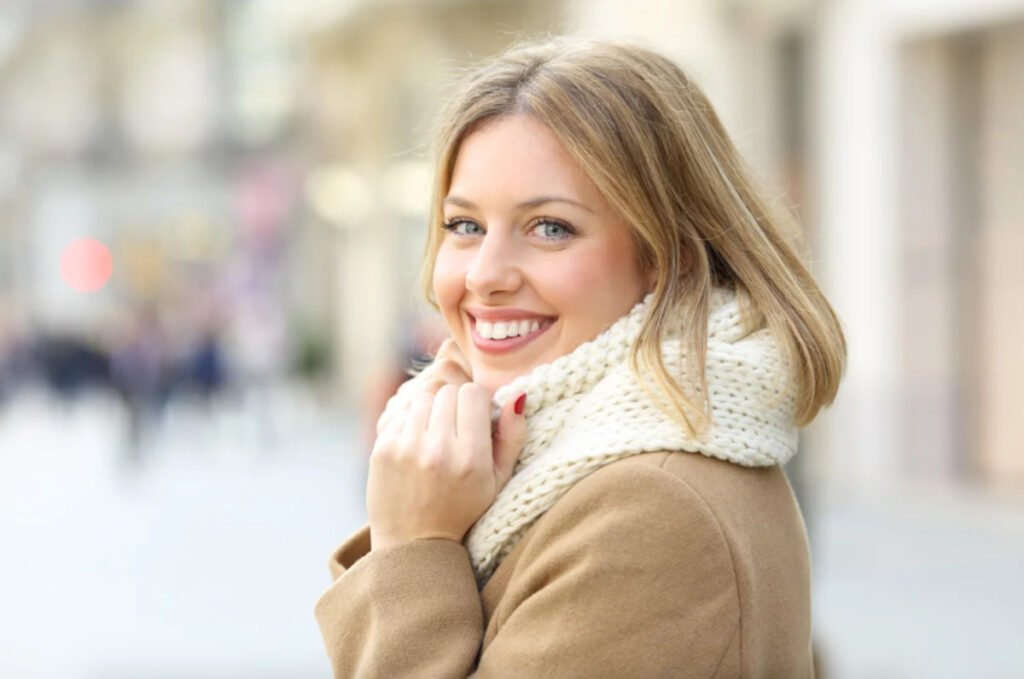 Boston woman smiling during the cold winter months