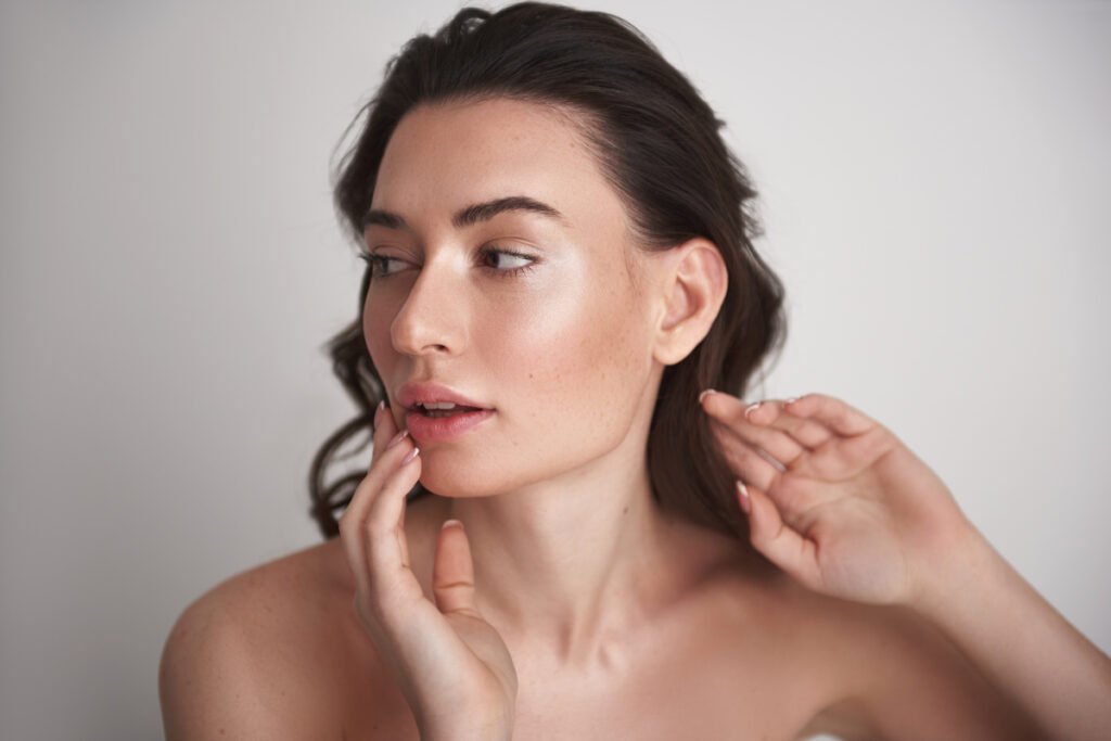 Woman with defined jawline after Juvederm and Kybella treatments