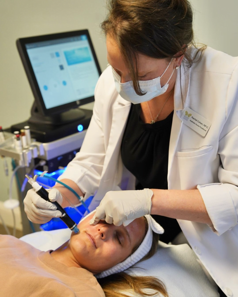 Woman getting a Hydrafacial treatment at Boston Plastic Surgery's Skin Wellness Center