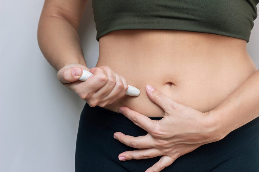 Woman administering semaglutide injections for weight loss